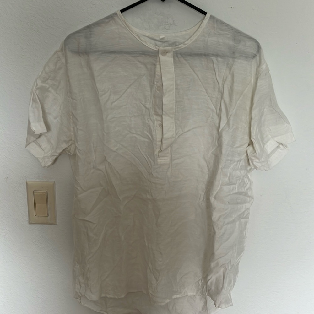 Size medium white quarter button up T-shirt